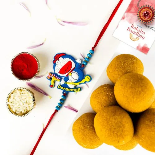 Charming Doraemon Rakhi & Ladoo Surprise