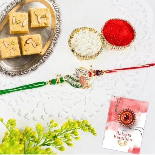 Mesmerizing Peacock Rakhi and Soan Papdi Treat