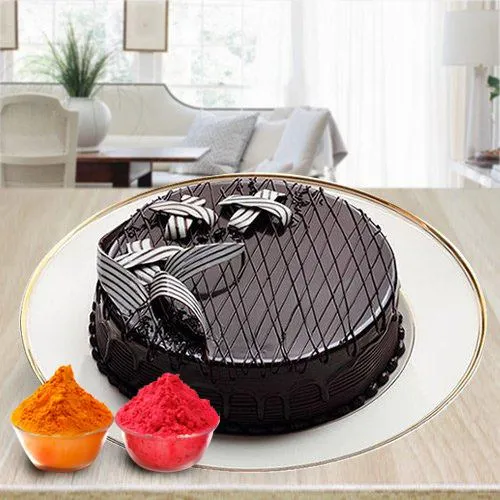 Fresh Baked Chocolate Cake 2 Kg. Filled with Soft Creams from top bakery in the city with free Gulal/Abir Pouch.