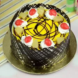 Enjoyable Eggless Pineapple Cake in Round Shape