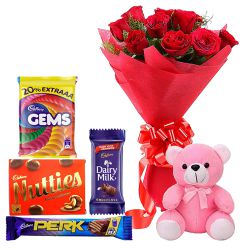 Small Teddy, Assorted Cadburys Chocolate and 12 Red Roses Bouquet Small Teddy, Assorted Cadburys Chocolate and 12 Red Roses Bouquet
