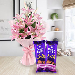 Wonderfully Arranged Pink Lilies with Dairy Milk Silk for Birth-Day Wonderfully Arranged Pink Lilies with Dairy Milk Silk for Birth-Day