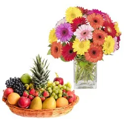 Shop for Fresh Fruits Basket with Gerberas in a Vase
