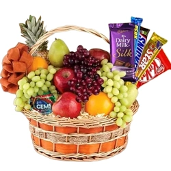 Tasty Assorted Chocolates Gift Hamper with Mixed Fruits