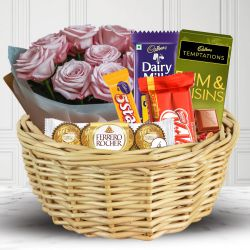 Yummy Chocolates Hamper with Pink Roses Buquet