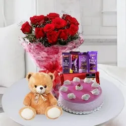 Order Strawberry Cake with Chocolates, Rose Bouquet N Teddy for Birthday