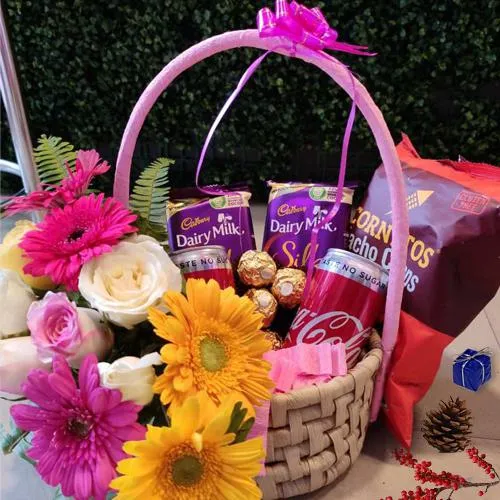 Enticing Basket Full of Chocolates with Pepsi Can n Nachos
