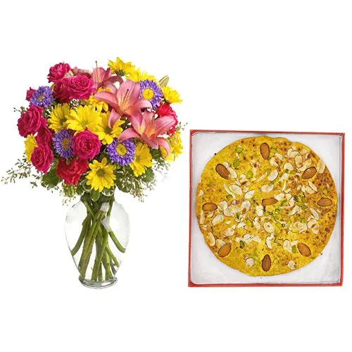 Badam Rotlo from Kandoi Bhogilal Mulchand with Mixed Flower Arrangement
