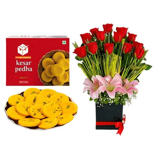 Kesar Mewa Peda from Mohanlals Mithaiwala with a Designer Flower Arrangement