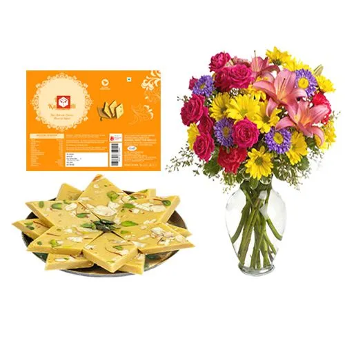 Kesar Kaju Katli from Mohanlals Mithaiwala with a Mixed Flower Arrangement