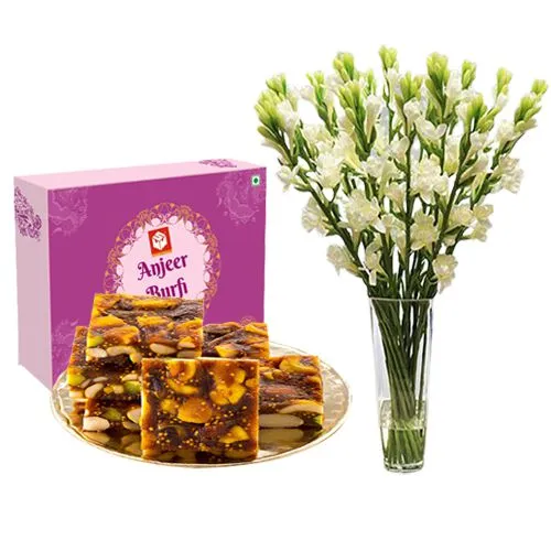 Anjeer Pak from Mohanlals Mithaiwala with a Rajnigandha Stems in a Glass Vase