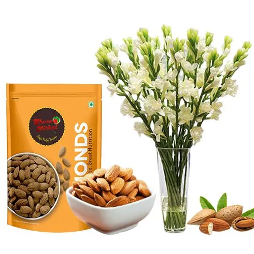 Royal Almond Treat from Shree Mithai with Rajnigandha Stems in a Glass Vase