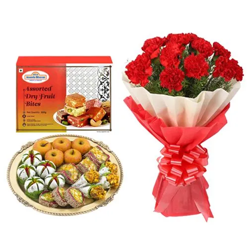 Assorted Dry Fruit Sweets from Adyar Ananda Bhawan with Red Carnation Tissue Wrapped Bouquet