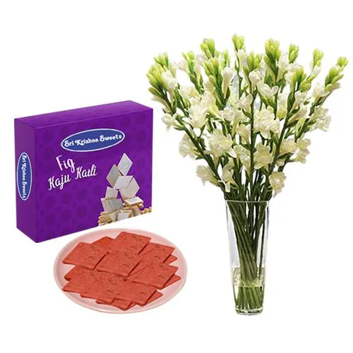 Fig Kathli from Sri Krishna Sweets with a Rajnigandha Stems in a Glass Vase