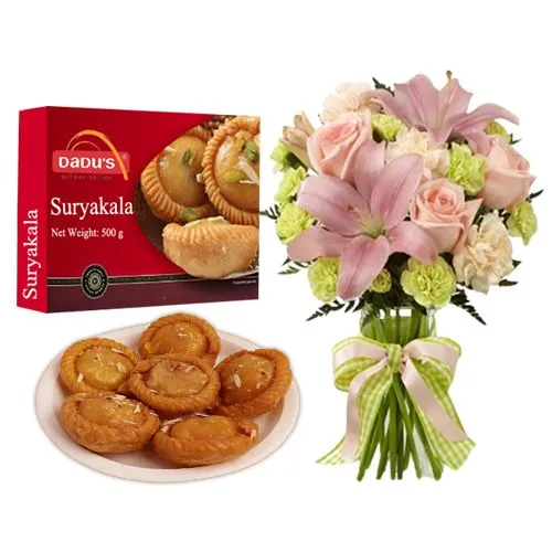 Suryakala from Dadus with a Flowers Bouquet