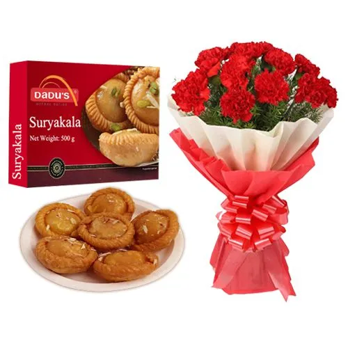 Suryakala from Dadus with Red Carnation Tissue Wrapped Bouquet