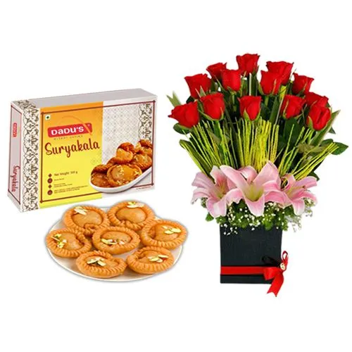 Suryakala from Dadus with a Designer Flower Arrangement