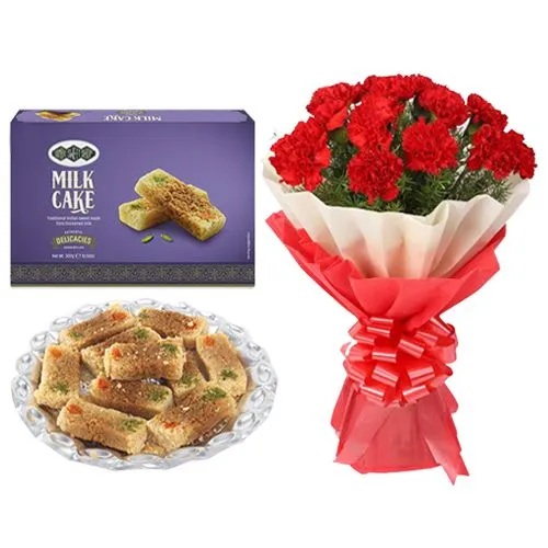 Milk Cake from Bombay Sweet Shop with Red Carnation Tissue Wrapped Bouquet