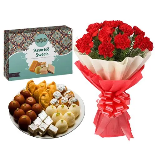 Assorted Sweets from Bombay Sweet Shop with Red Carnations