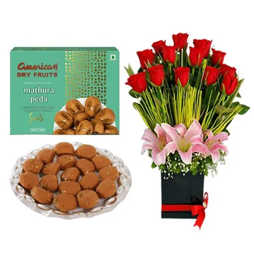 Mathura Peda from American Dry Fruits with a Designer Flower Arrangement