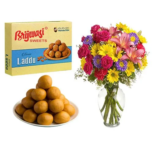 Besan Laddu from Brijwasi Sweets with Mixed Flower Arrangement