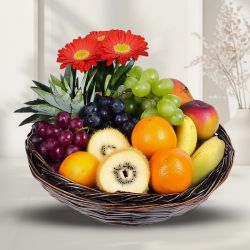 Delectable Fruit Basket with Floral Decoration