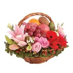 Provocative Basket of Fresh Fruits decorated with Lily, Roses n Gerberas
