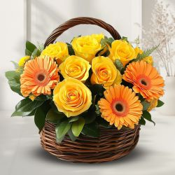 Ravishing Yellow Roses n Orange Gerberas Basket