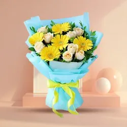 Exotic Tissue Wrapped Yellow Gerberas N White Roses Bouquet