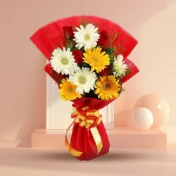 Gorgeous Tissue Wrapped Gerbera N Roses Bouquet