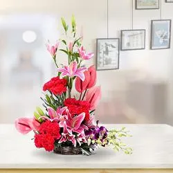 Designer Arrangement of Pink Anthurium with Cala Lilies