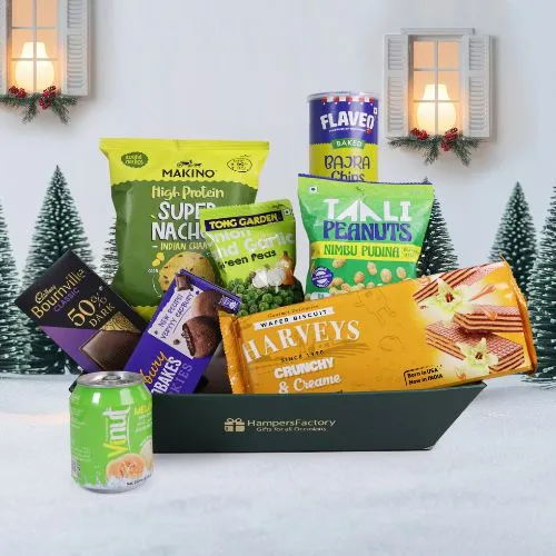 Looking for the ultimate holiday treat? This Gourmet Christmas Treat Gift Set is packed with an amazing variety of snacks that will bring joy to any celebration  With everything from protein rich nachos and crunchy peas to decadent chocolates and creamy wafers, there’s something for everyone to enjoy  Plus, the reusable basket makes for a great gift that keeps on giving!