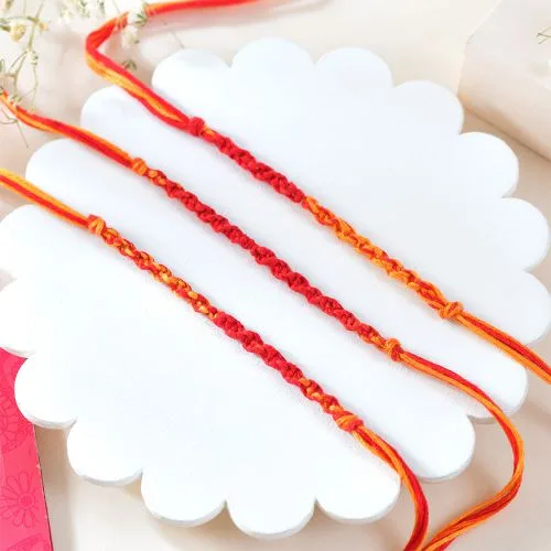 Charming Rakhi Trio Gift Set
