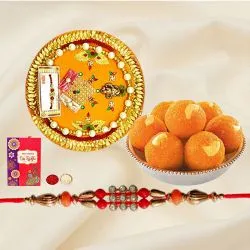 Laddoo and Designer Pooja Thali along Rakhi, Roli, Tilak and Chawal