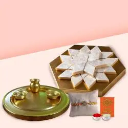 Kaju Katli and Silver Plated Puja Thali along Rakhi, Roli, Tilak and Chawal