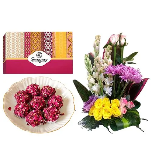 Kaju Rose Laddu from Sangam Sweets with a Mixed Flower Arrangement