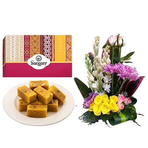 Mysore Pak from Sangam Sweets with a Mixed Flower Arrangement	