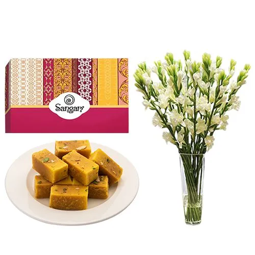 Mysore Pak from Sangam Sweets with Rajnigandha Stems in a Glass Vase