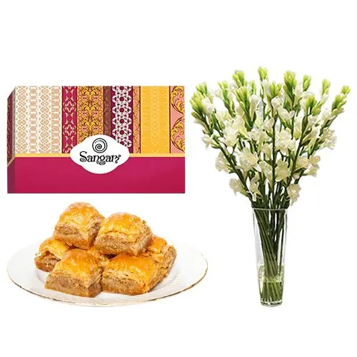 Desi Baklava from Sangam Sweets with Rajnigandha Stems in a Glass Vase