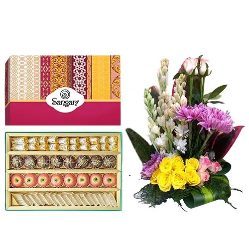 Cashew Delight from Sangam Sweets with a Mixed Flower Arrangement	