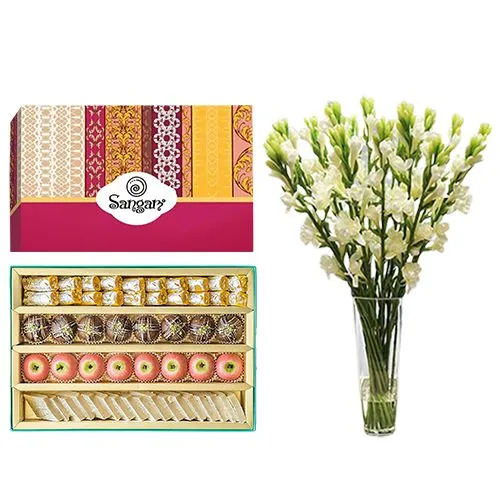 Cashew Delight from Sangam Sweets with Rajnigandha Stems in a Glass Vase