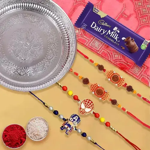Silver Plated Rakhi Thali with 2 Om Rakhi 2 Kids Rakhi and 1 Dairy Milk  
