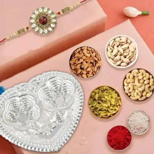 Rakhi with Silver Paan Thali & Dry Fruits Combo