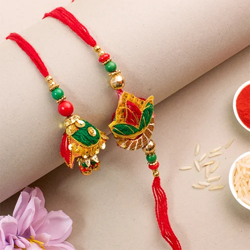 Delightful Bhaiya Bhabhi Rakhi with Roli Chawal Tika n Card