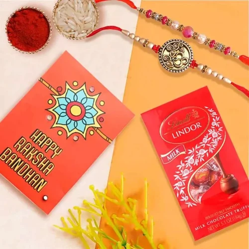Charming Pair of Rakhi with Lindt Chocolates Free Roli Tika n Card