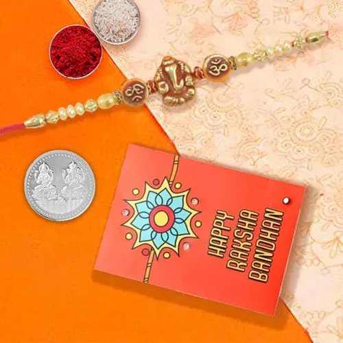 Elegant Ganesh Rakhi with Silver Coin Set