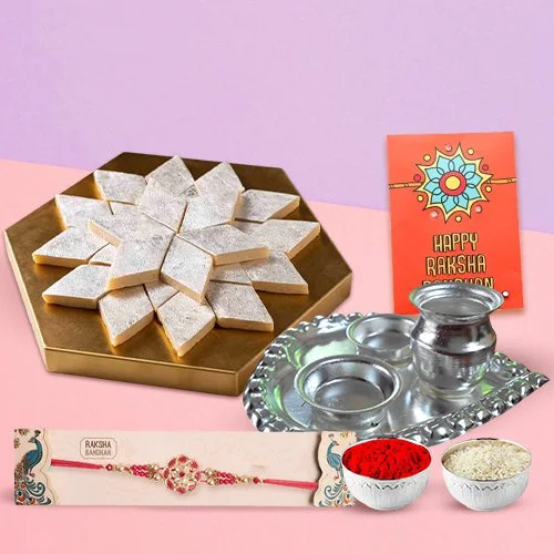 Kaju Katli from Haldiram and Silver Plated Paan Shaped Puja Aarti Thali along with Rakhi